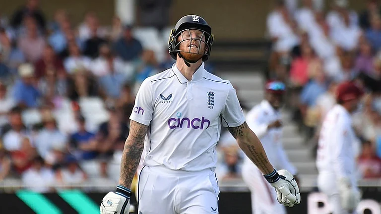Ben Stokes reacts after being after dismissed by Kavem Hodge - | Photo: AP/Rui Vieira